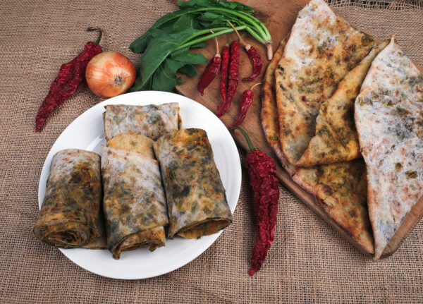 Hatay'ın hamur işi lezzetlerinde ıspanaklı katıklı ekmeği her öğünde tüketebilirsiniz